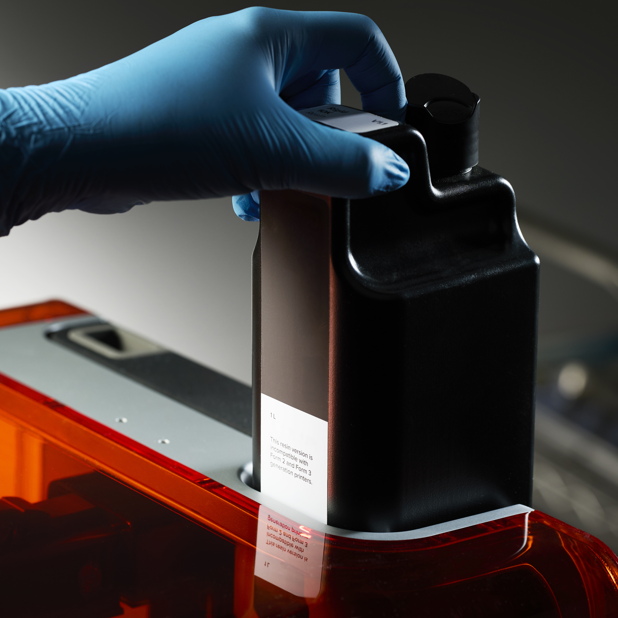 Formlabs Form 4 Resin Cartridge Being Inserted Into Printer